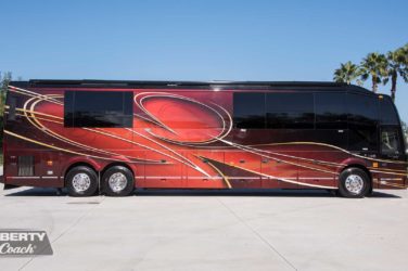 2016 Elegant Lady #5389 exterior entry side view of motorcoach on the lot
