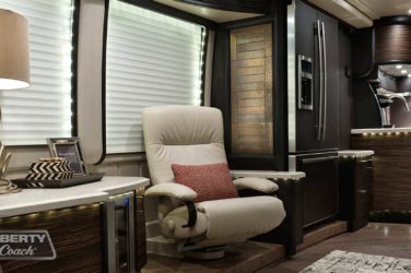 2016 Elegant Lady #5389 motorcoach interior view of side chairs and table