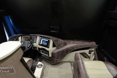 2017 Elegant Lady #5371 motorcoach interior cockpit with driver seat and dashboard area