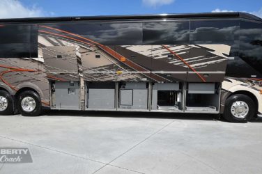 2017 Elegant Lady #5371 exterior entry side undercarriage outside hot/cold spigot and storage bays of motorcoach