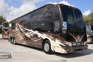 2017 Elegant Lady #5371 exterior entry side front view of motorcoach on the lot