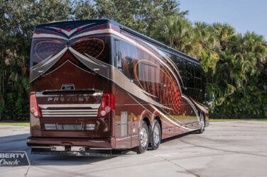 2018 Liberty Coach #897-A exterior entry side rear view of motorcoach on the lot