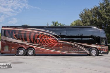 2018 Liberty Coach #897-A exterior entry side view of motorcoach on the lot