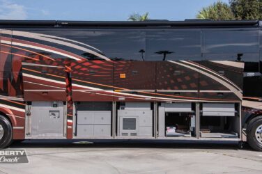 2018 Liberty Coach #897-A exterior entry side undercarriage storage bays with pull out drawers of motorcoach