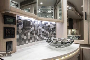 2019 Elegant Lady #7191 motorcoach interior view of bathroom vanity and vessel sink