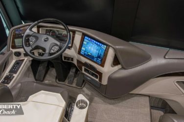 2019 Elegant Lady #7191 motorcoach interior cockpit with driver seat and dashboard area