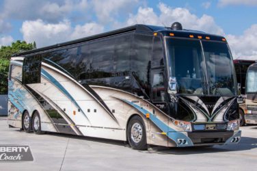 2019 Elegant Lady #7191 exterior entry side front view of motorcoach on the lot