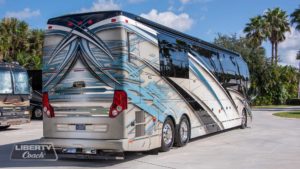 2019 Elegant Lady #7191 exterior entry side rear view of motorcoach on the lot