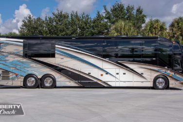 2019 Elegant Lady #7191 exterior entry side view of motorcoach on the lot