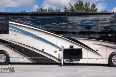 2019 Elegant Lady #7191 exterior entry side undercarriage close-up of E-Center outside bay of motorcoach