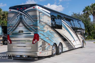 2019 Elegant Lady #7191 exterior entry side rear view of motorcoach on the lot