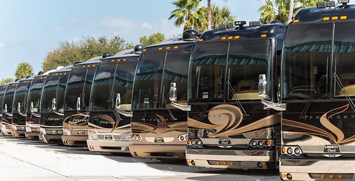 Liberty Coach Florida Dealership - Several Elegant Lady Motorcoaches in a Row