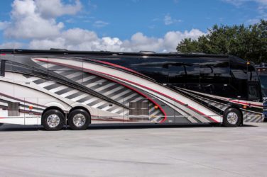 2020 Elegant Lady #7190 exterior entry side view of motorcoach on the lot