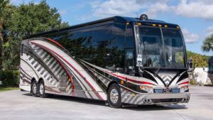 2020 Elegant Lady #7190 exterior entry side front view of motorcoach on the lot