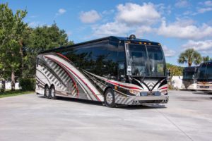 2020 Elegant Lady #7190 exterior entry side front view of motorcoach on the lot