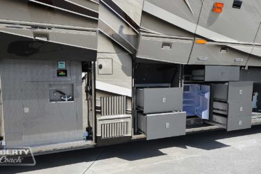 2021 Elegant Lady #5376 exterior driver side undercarriage open mechanical and storage bays of motorcoach