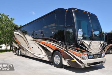 2021 Elegant Lady #5376 exterior entry side front view of motorcoach on the lot