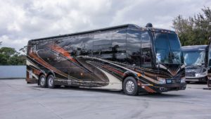 2020 Elegant Lady #863 exterior entry side front view of motorcoach on the lot