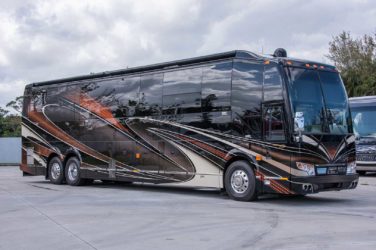 2020 Elegant Lady #863 exterior entry side front view of motorcoach on the lot