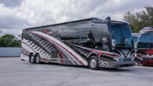 2020 Elegant Lady #864 exterior entry side front view of motorcoach on the lot