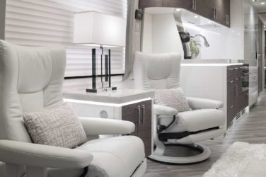 2020 Elegant Lady #864 motorcoach interior view of side chairs and table