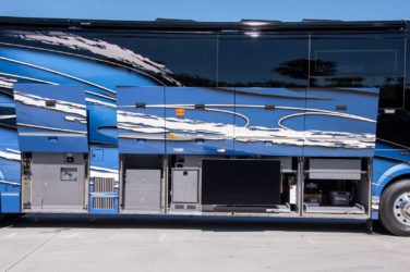 2021 Elegant Lady #866 exterior entry side undercarriage bays of motorcoach