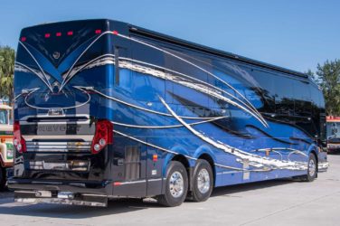 2021 Elegant Lady #866 exterior entry side rear view of motorcoach on the lot