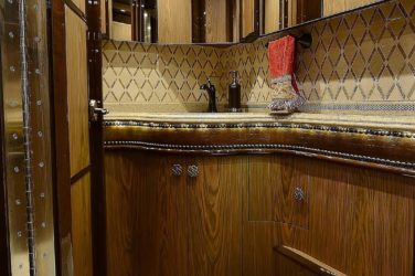 2015 Elegant Lady #5390 motorcoach interior view of bathroom, vanity