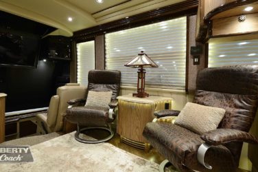 2015 Elegant Lady #5390 motorcoach interior view of side chairs and table