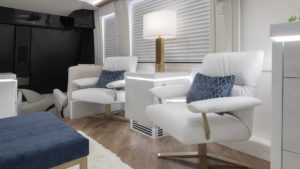 2021 Elegant Lady #875 motorcoach interior view of side chairs and table