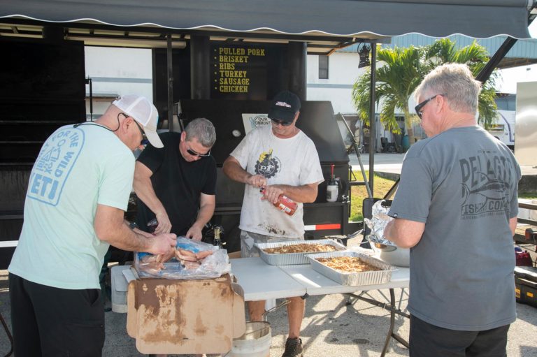20th Annual Rally - Men Grilling
