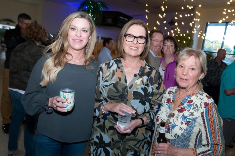 20th Annual Rally - Women Enjoying Drinks and Conversation