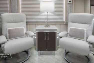 2022 Elegant Lady #880 motorcoach interior view of side chairs and table