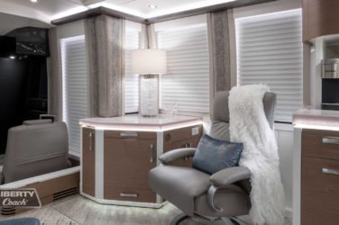 2022 Elegant Lady #881 motorcoach interior view of side chairs and table