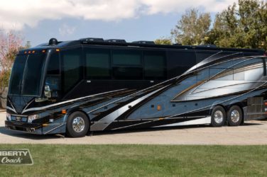2022 Elegant Lady #882 exterior entry side front view of motorcoach on the lot