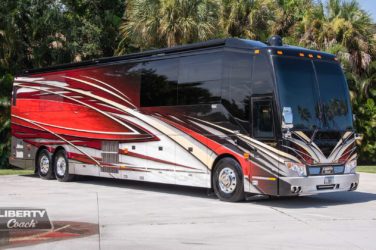 2022 Elegant Lady #883 exterior entry side front view of motorcoach on the lot