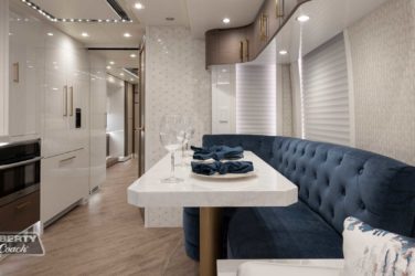 2022 Elegant Lady #884 motorcoach interior front look view of galley and dining area