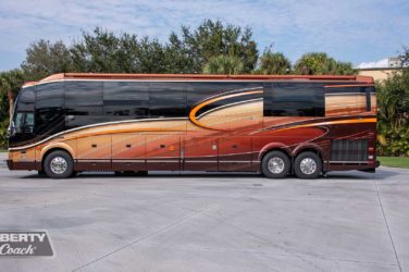 2013 Elegant Lady #5362 exterior driver side view of motorcoach on the lot