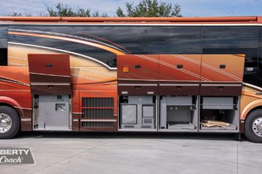 2013 Elegant Lady #5362 exterior entry side undercarriage outside hot/cold spigot and storage bays of motorcoach