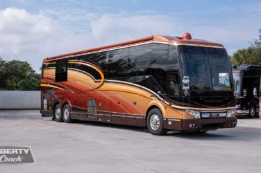 2013 Elegant Lady #5362 exterior entry side front view of motorcoach on the lot