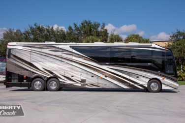 2022 Elegant Lady #886 exterior entry side view of motorcoach on the lot