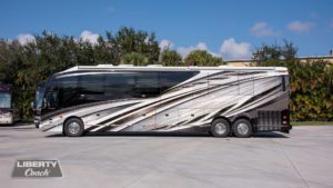 2022 Elegant Lady #886 exterior driver side view of motorcoach on the lot