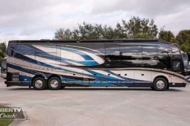 2022 Elegant Lady #887 exterior driver side view of motorcoach on the lot