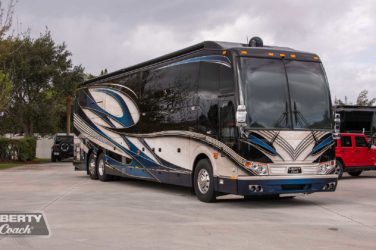 2022 Elegant Lady #887 exterior entry side front view of motorcoach on the lot