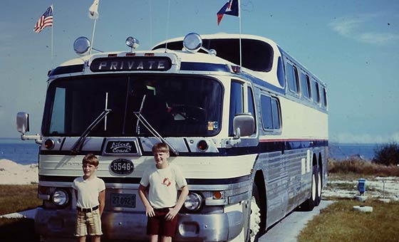 Frank and Kurt Konigseder standing in front of Motorcoach
