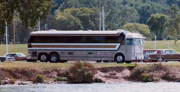 Motorcoach in a rest stop near lake