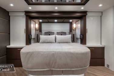 2022 Elegant Lady #888 motorcoach interior view of bed in bedroom