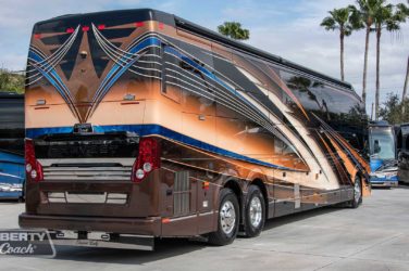 2022 Elegant Lady #888 exterior entry side rear view of motorcoach on the lot