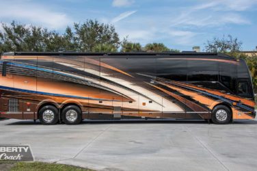 2022 Elegant Lady #888 exterior entry side view of motorcoach on the lot