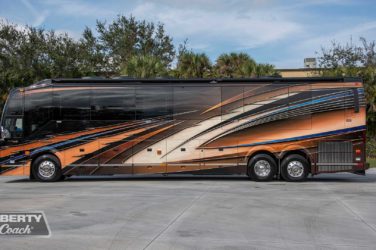 2022 Elegant Lady #888 exterior driver side view of motorcoach on the lot